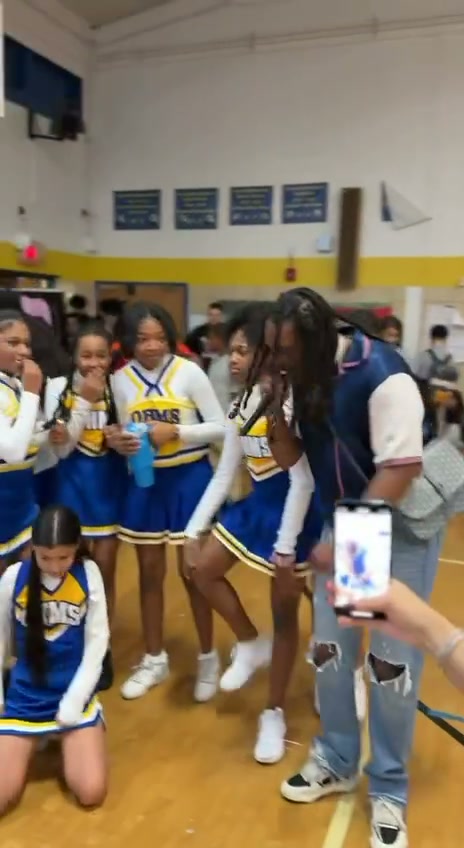 Derrell with students